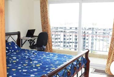 Scenic Cityscape View from Bedroom Window at Independent Serviced Apartment in Chennai