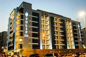 Exterior night view at Tulip Hotel Apartments in Bur Dubai